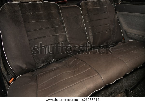 Novosibirsk,
Russia – January 24, 2020:  LADA 2110 , close-up of the  gray  rear
seats with seats belt. modern car
interior
