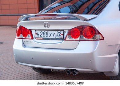 Novosibirsk, Russia – July 07, 2019:   Honda Civic,  Close Up Of A  Back View Car Sedan  Headlight, Bumper, Wheel Parking In A Modern Parking Outdoor In Summer Day