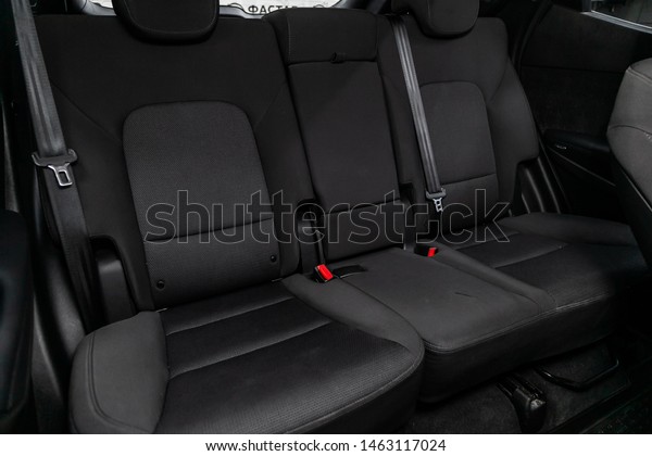 Novosibirsk, Russia – July 08, 2019:  Hyundai\
Santa Fe, close-up of the black  rear seats with seats belt. modern\
car interior\

