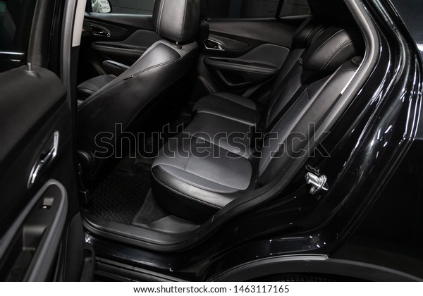 Novosibirsk, Russia – July 08, 2019:  Opel\
Mokka, close-up of the black leather rear seats with seats belt.\
modern car\
interior\

