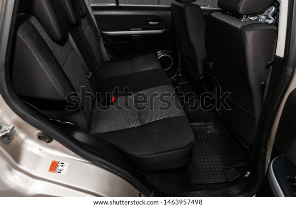 Novosibirsk, Russia – July 08, 2019: Suzuki\
Grand Vitara, close-up of the black  rear seats with seats belt.\
modern car\
interior\
