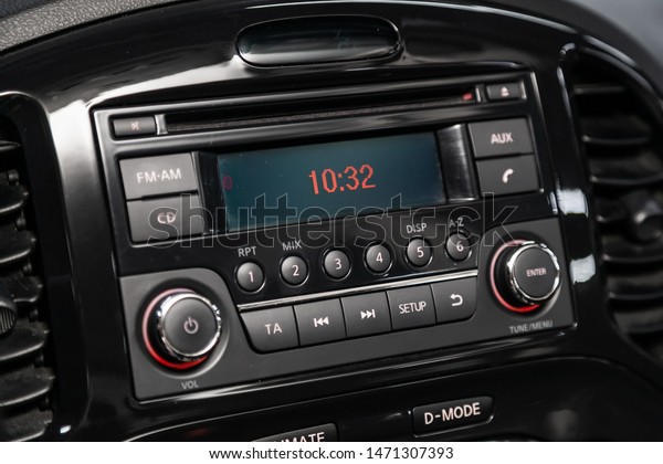 Novosibirsk, Russia – July 12,\
2019:  Nissan Juke,  Car control panel of audio player and other\
devices\
.A shallow depth of field close up of the control panel of\
a car. 