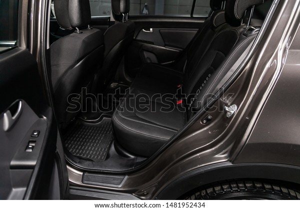 Novosibirsk,\
Russia – July 31, 2019:  Kia Sportage, close-up of the black  rear\
seats with seats belt. modern car\
interior\
