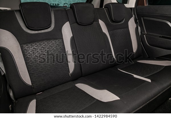 Novosibirsk,
Russia – June 11, 2019:  LADA XRAY, close-up of the black  rear
seats with seats belt. modern car
interior

