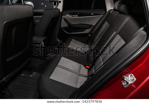 Novosibirsk,\
Russia – June 11, 2019:  BMW X1, close-up of the black  rear seats\
with seats belt. modern car\
interior\
\
