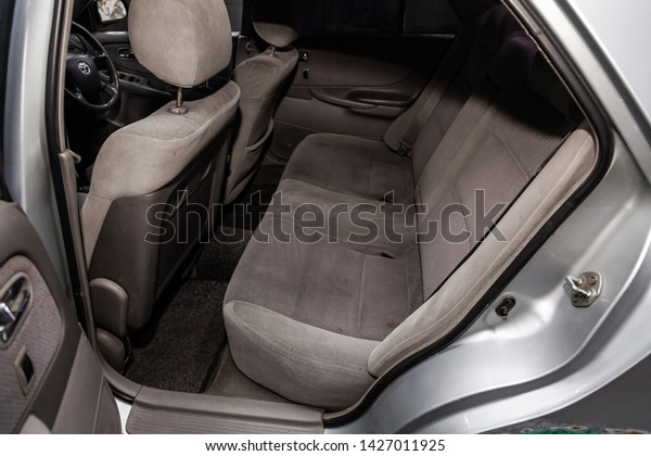 Novosibirsk, Russia – June 14, 2019:  Mazda\
Capella, close-up of the gray  rear seats with seats belt. modern\
car interior\
\
