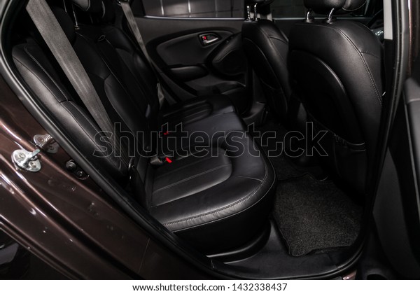 Novosibirsk, Russia – June 18, 2019:  Hyundai\
ix35, close-up of the black leather rear seats with seats belt.\
modern car\
interior\
