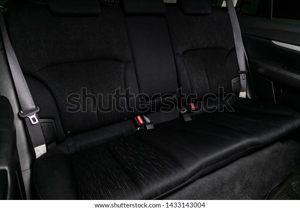 Novosibirsk,\
Russia – June 18, 2019:  Subaru Outback,close-up of the black  rear\
seats with seats belt. modern car\
interior\
