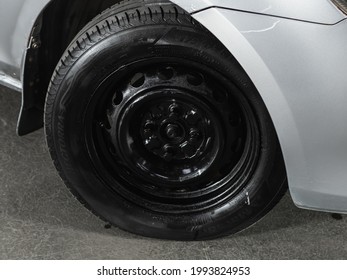 Novosibirsk, Russia - June 19, 2021: Mazda Demio, Close-up Of The Bumper, Wheel