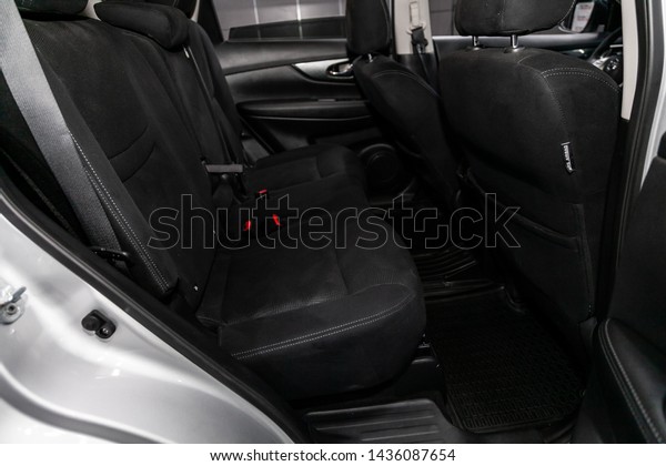 Novosibirsk, Russia – June 22, 2019:  Nissan X-trail, \
close-up of the black  rear seats with seats belt. modern car\
interior\
 