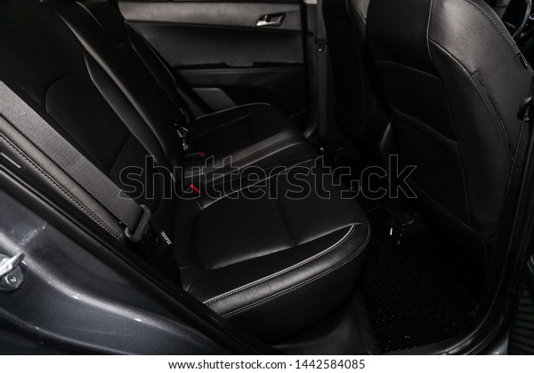 Novosibirsk, Russia – June 28, 2019: Hyundai\
Creta, close-up of the black leather rear seats with seats belt.\
modern car\
interior\
