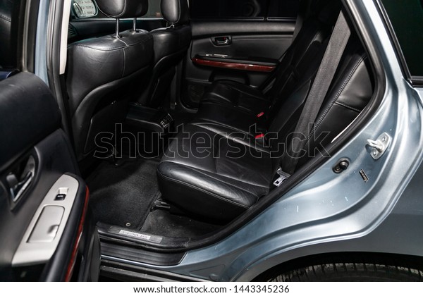 Novosibirsk, Russia – June 28, 2019:  Lexus RX-350,\
close-up of the black  leather rear seats with seats belt. modern\
car interior\
 \
