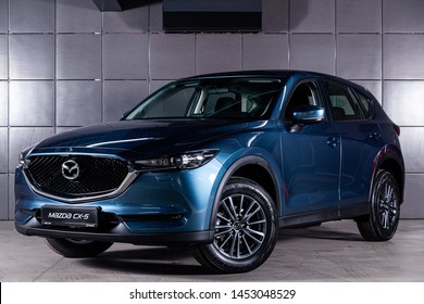 Novosibirsk, Russia – June 30, 2019:  blue Mazda CX-5,front view.  Photography of a modern crossover made in Japan on a parking in Novosibirsk