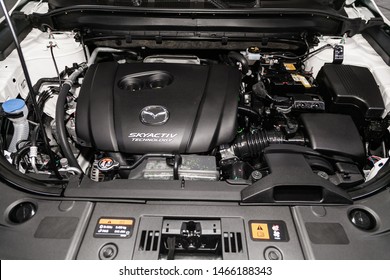 Novosibirsk, Russia – June 30, 2019:  Mazda CX-5, close-up of the engine, front view. Internal combustion engine, car parts, deteyling