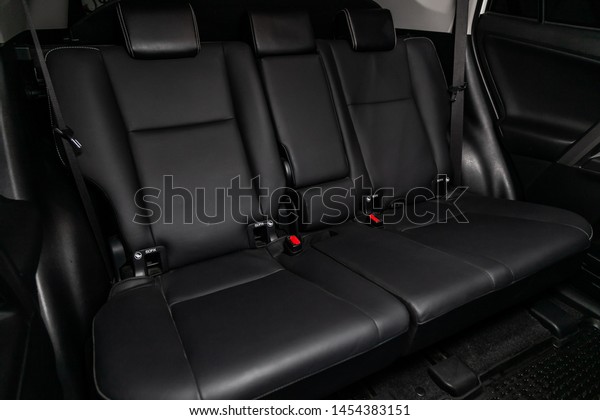 Novosibirsk, Russia – June 30, 2019: Toyota RAV-4,\
close-up of the black  rear seats with seats belt. modern car\
interior\
 