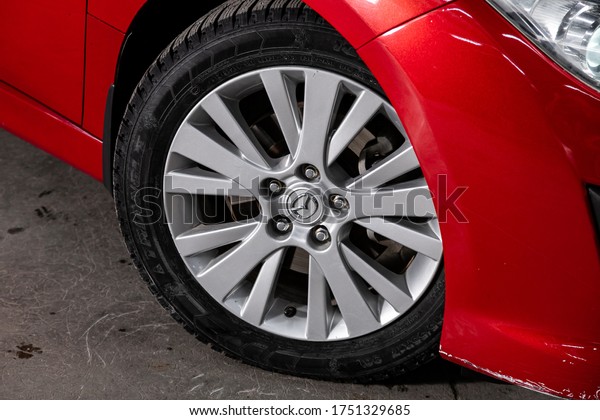 Novosibirsk/ Russia – March 04, 2020: Mazda 6, Car\
wheel with alloy wheel and new rubber on a car closeup. Wheel\
tuning disc\
