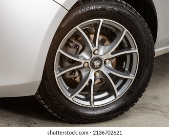 Novosibirsk, Russia -  March   08 , 2022:  Mazda Demio, Car Wheel On  Car - Close Up