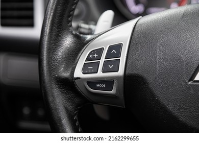 Novosibirsk, Russia -March 08, 2022: Mitsubishi Outlander XL,  black steering wheel with multifunction buttons for quick control phone, music and other function