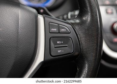 Novosibirsk, Russia -March 08, 2022: Suzuki SX4,  black steering wheel with multifunction buttons for quick control phone, music and other function