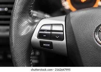 Novosibirsk, Russia -March 08, 2022:  Toyota Corolla,  black steering wheel with multifunction buttons for quick control phone, music and other function