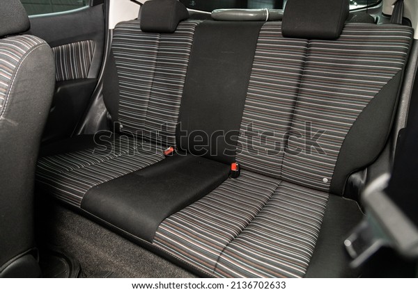 Novosibirsk, Russia
-  March   08 , 2022:  Mazda Demio, Rear seat for passengers in
black textile. Comfort car
inside.