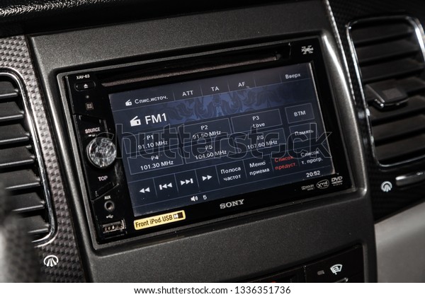 Novosibirsk, Russia - March\
10, 2019:  Ssangyong Actyon,close-up of the dashboard, monitor with\
player, radio. Photography of a modern car on a parking in\
Novosibirsk\
