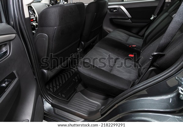Novosibirsk, Russia - March 11, 2022:  Mitsubishi\
Pajero Sport, Rear seat for passengers in black textile. Comfort\
car inside.