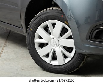 Novosibirsk, Russia - March 20 , 2022:   Lada Granta,  Front Wheel Of A Gray Car, Rear View