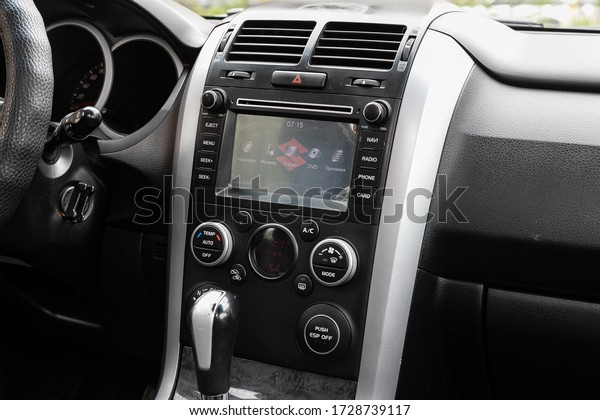 Novosibirsk/ Russia – May 02 2020: Suzuki\
Grand Vitara,close-up of the central control panel, monitor with\
music and radio , adjustment of the blower, air conditioner,\
player. modern car\
interior\

