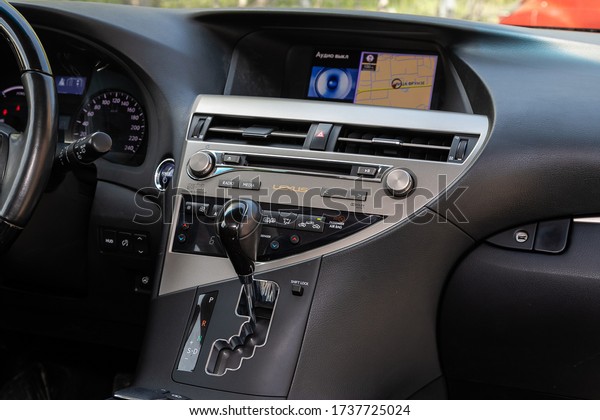 Novosibirsk/ Russia – May 03 2020:\
Lexus RX 330, close-up of the central control panel, monitor with\
music and radio , adjustment of the blower, air conditioner,\
player. 