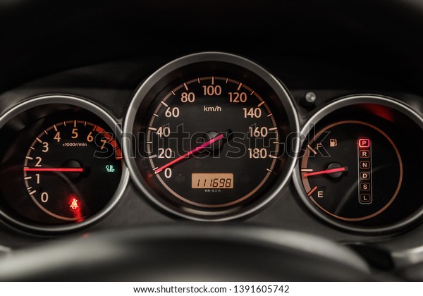 Novosibirsk, Russia - May 06,\
2019:  Honda Fit Aria,close-up of the dashboard, speedometer and\
tachometer. Photography of a modern car on a parking in\
Novosibirsk\
