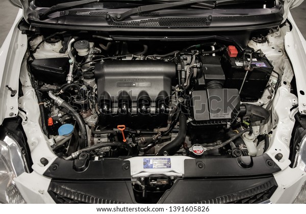 Novosibirsk, Russia - May 06, 2019:  Honda\
Fit Aria,close-up of the engine, front view. Photography of a\
modern car on a parking in\
Novosibirsk\

