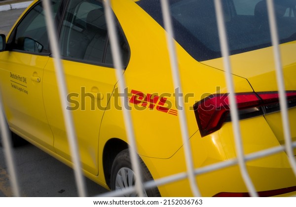 Novosibirsk, Russia. May 1, 2022 - DHL yellow car.\
German Postal Service. Yellow special DHL car of the postal\
delivery service. Selective\
focus