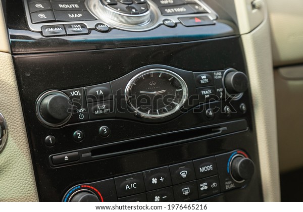 Novosibirsk,\
Russia - May 16, 2021: Infiniti QX,  black car interior:\
radio,audio system  and control\
buttons\
