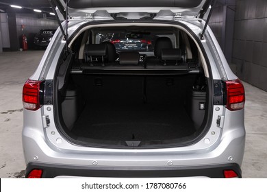 Novosibirsk/ Russia – May 25 2020: Mitsubishi Outlander, Rear view of a car with an open trunk. Exterior of a modern car