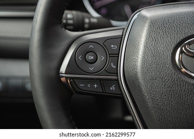 Novosibirsk, Russia -May 29, 2022:  Toyota Camry,  black steering wheel with multifunction buttons for quick control phone, music and other function