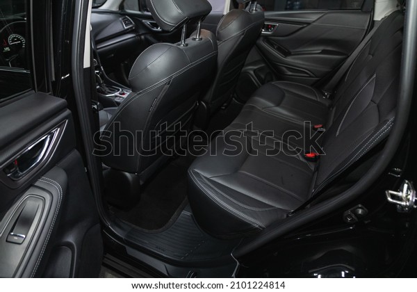Novosibirsk, Russia - November 04, 2021: Subaru\
Forester, Rear seat for passengers in black  leather. Comfort car\
inside.\
