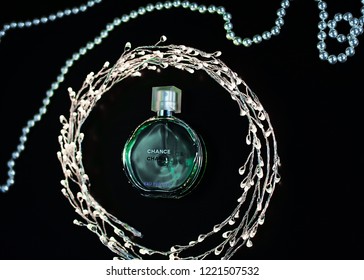 Novosibirsk, Russia- November 05, 2018 : Chanel Perfume In The Style Of Magazine Shooting With  A String Of Pearls And A Book                               