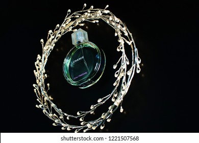 Novosibirsk, Russia- November 05, 2018 : Chanel Perfume In The Style Of Magazine Shooting With  A String Of Pearls And A Book                               