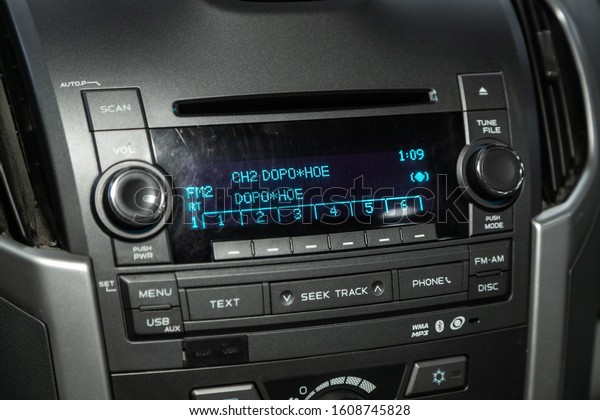 Novosibirsk, Russia – November 27, 2019:\
Volkswagen Polo,  Modern black car interior: radio,audio system\
with monitor  and control\
buttons\
\
