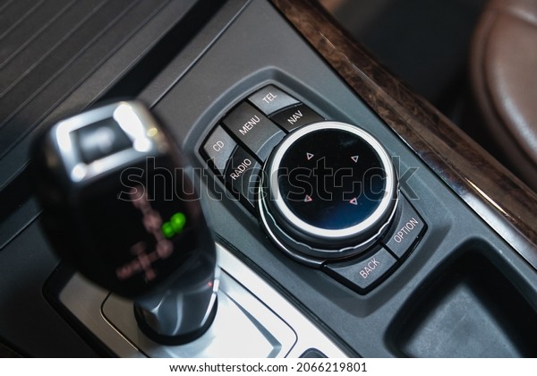 Novosibirsk, Russia - October 03,\
2021:  BMW X5, close-up of the central control panel, monitor with\
music and radio , adjustment of the blower, air conditioner,\
player. 