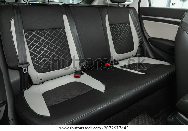 Novosibirsk, Russia - October 07, 2021: Lada\
Vesta SV cross, Rear seat for passengers in black leather. Comfort\
car inside.\
