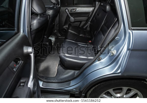 Novosibirsk, Russia – October 09, 2019: \
Honda CR-V,close-up of the black  leather rear seats with seats\
belt. modern car\
interior\
\
