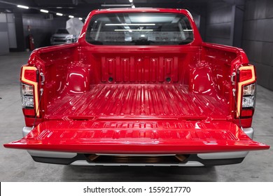 Novosibirsk, Russia – October 10, 2019:  Mitsubishi L200 , close-up of the open trunk, headlight, bumper,  front view. Exterior of a modern car  pickup