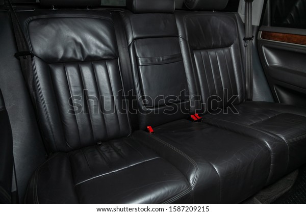 Novosibirsk, Russia – October 13, 2019: \
Volkswagen Touareg, close-up of the black  rear seats with seats\
belt. modern car\
interior\
\
