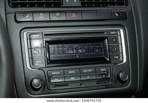 Novosibirsk, Russia – October 13, 2019: \
Volkswagen Polo,  Modern black car interior: radio, audio system\
with monitor  and control\
buttons\
\
