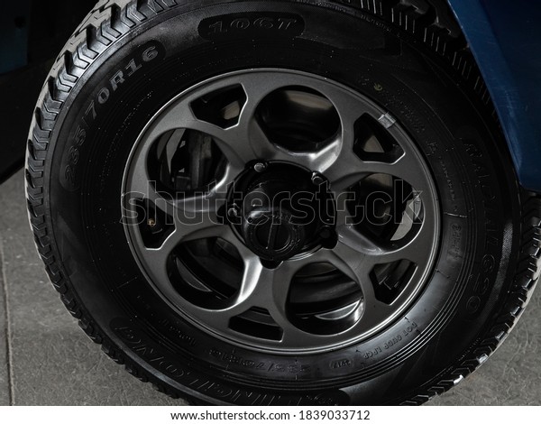 Novosibirsk, Russia – October 16, 2020: UAZ\
Patriot, Car wheel with alloy wheel and new rubber on a car\
closeup. Wheel tuning\
disc\
