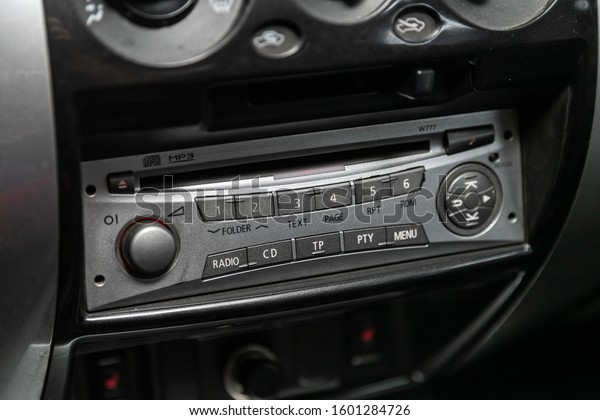 Novosibirsk, Russia – October 26, 2019:  Mitsubishi\
Pajero Sport, Audio stereo system, control panel, cd and radio in a\
modern car