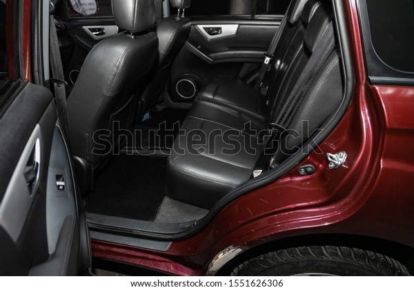 Novosibirsk, Russia – October 29, 2019:  Lifan\
X60, close-up of the black  leather rear seats with seats belt.\
modern car\
interior\
