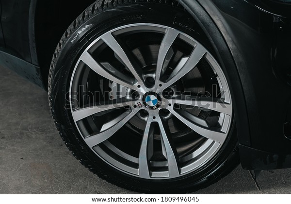 Novosibirsk, Russia – September 05, 2020:  BMW X5,\
 Car wheel with alloy wheel and new rubber on a car closeup. Wheel\
tuning disc\
